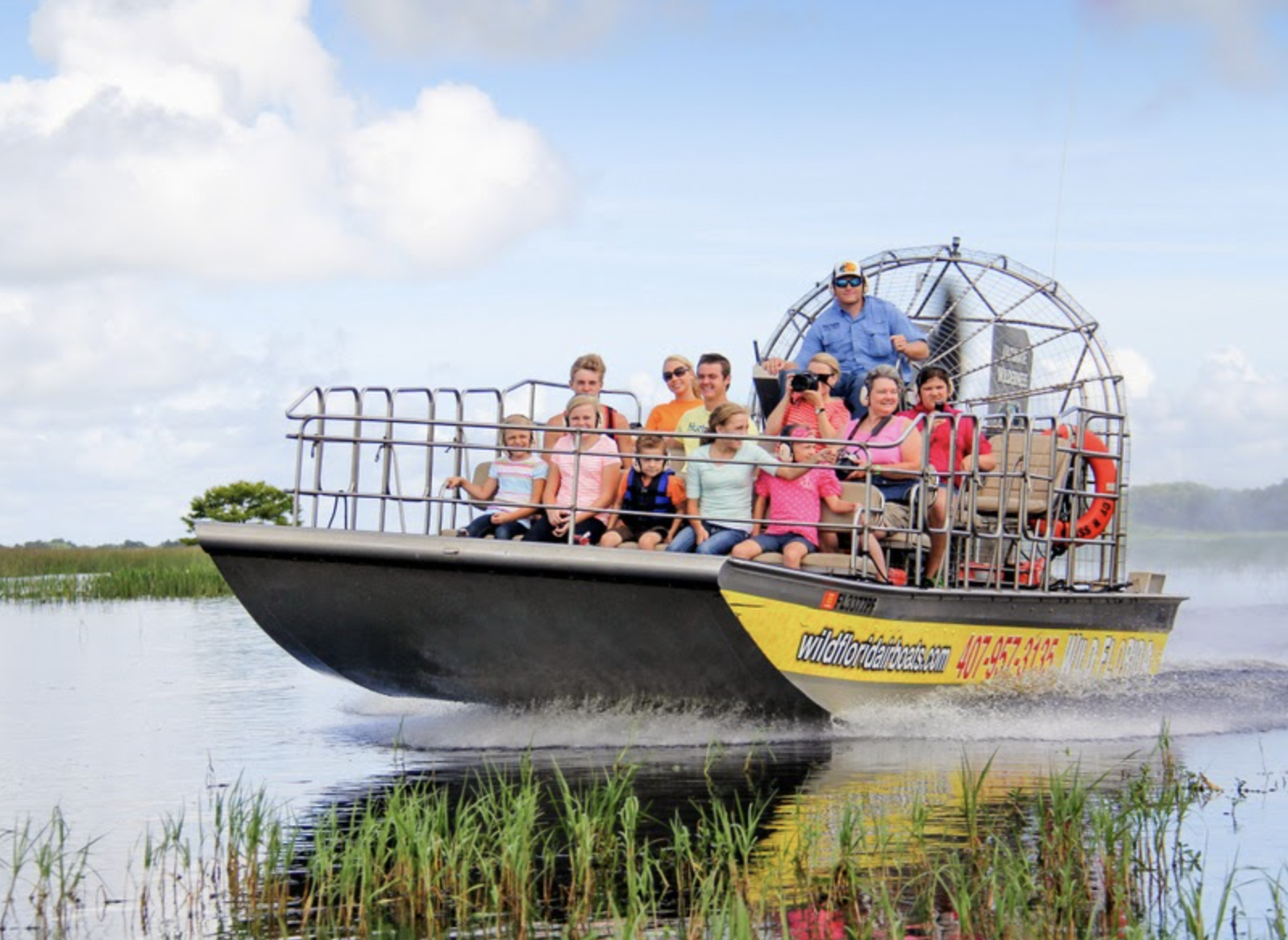 group of people on an airboat ride